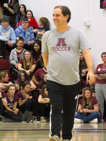 My time to shine. English teacher David McCarter steps out onto the court to go against a volleyball player.
