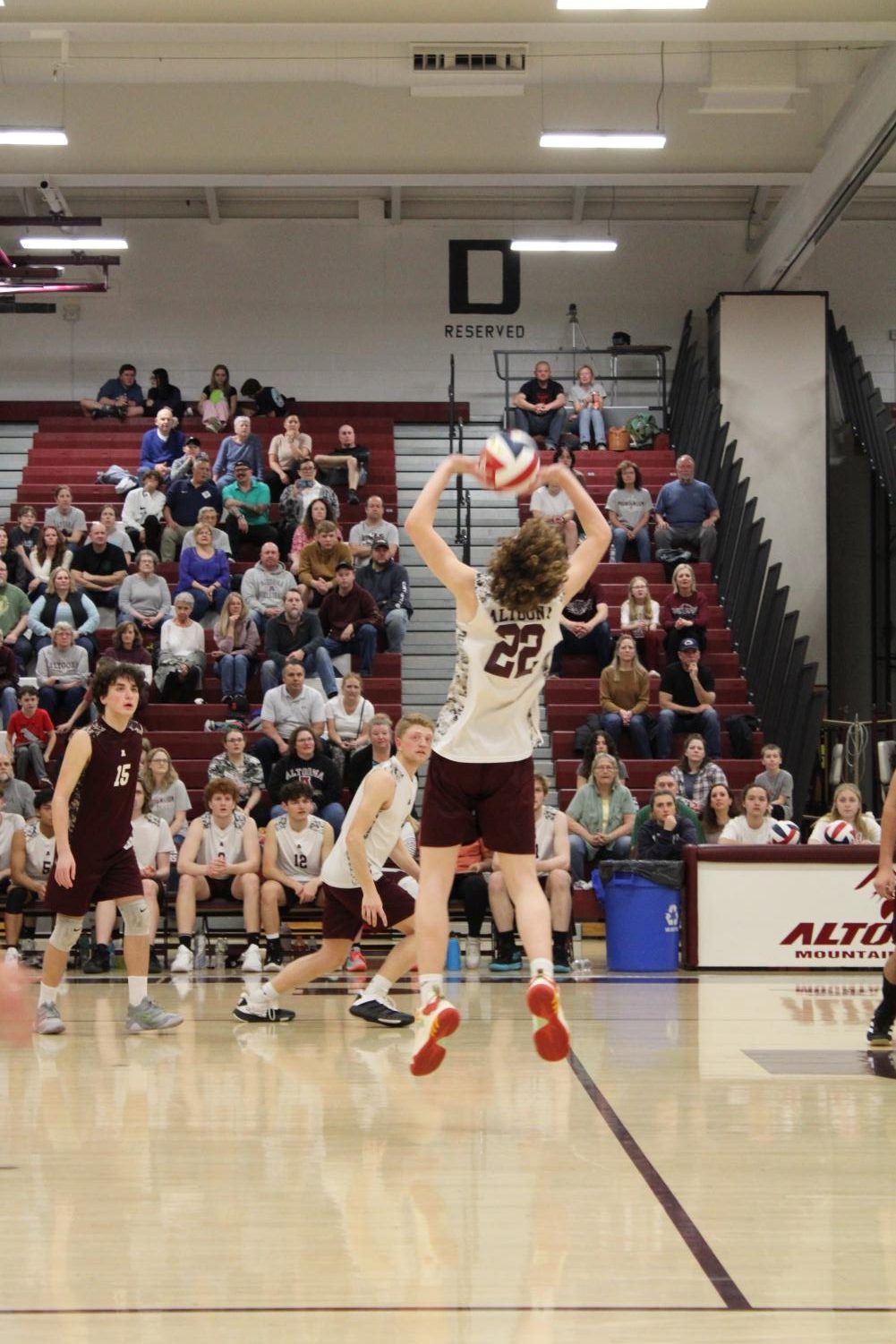 Sam Kessinger sets the ball for Garrett Baumgartner.