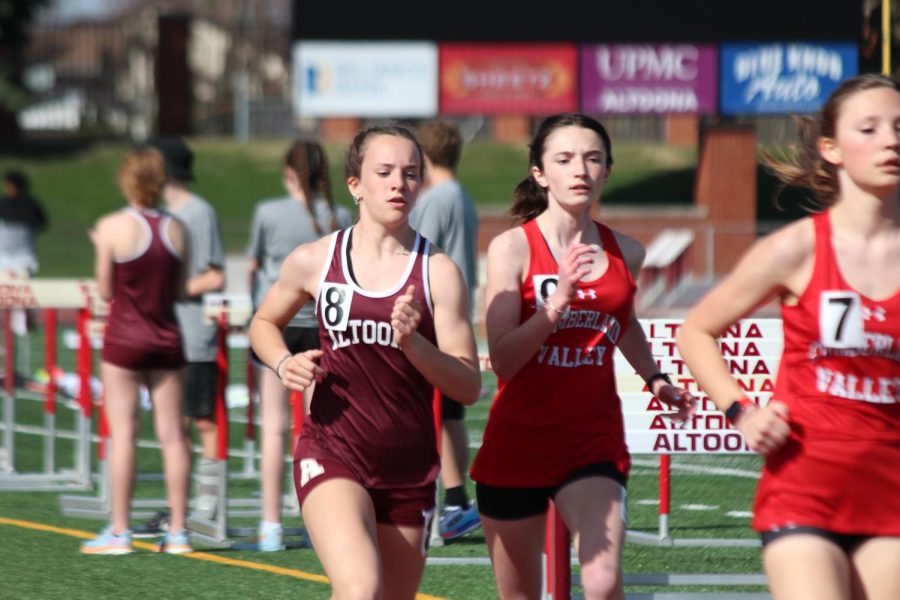 Keep Breathing. Freshman Emerson Snare runs in long distance at the meet on April 11, 2023. 