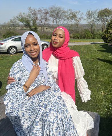 Nama and Neama  pose for their joint senior photo. The twins have been inseparable since birth, but they will soon be departing to study at different Ivy League schools. 