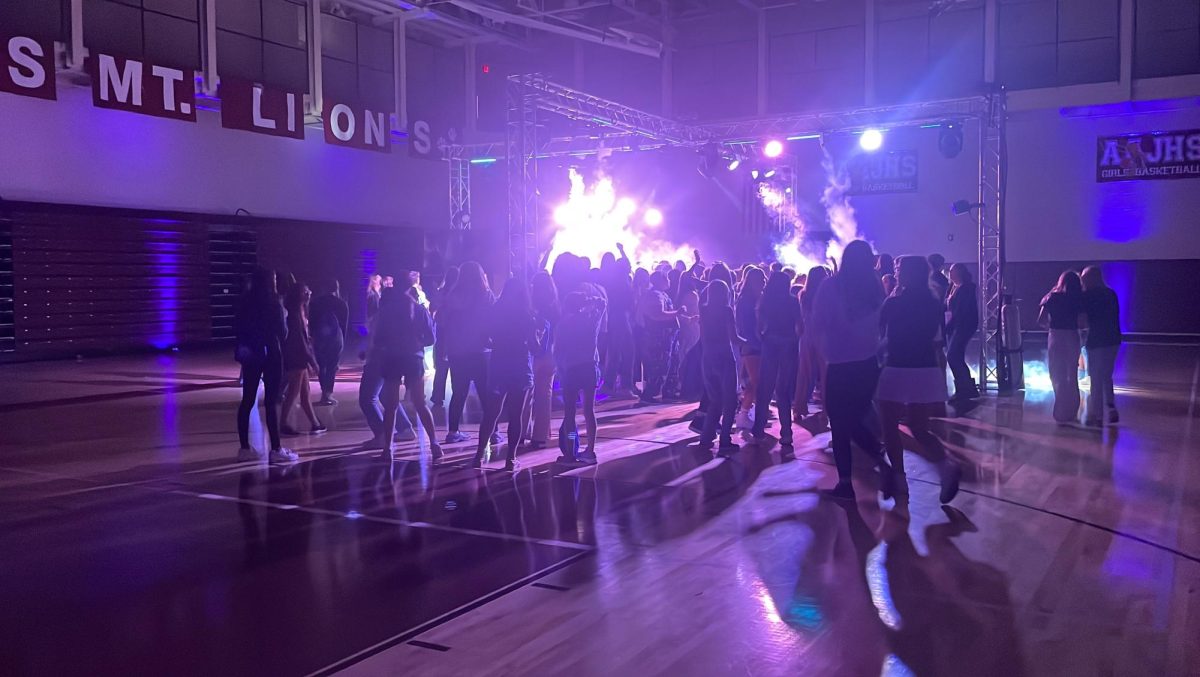 Party at AAJHS. Delegates dance and socialize while enjoying photo booths, fog machines and more. Students had two hours to enjoy the music and company before heading back  to the high school. 