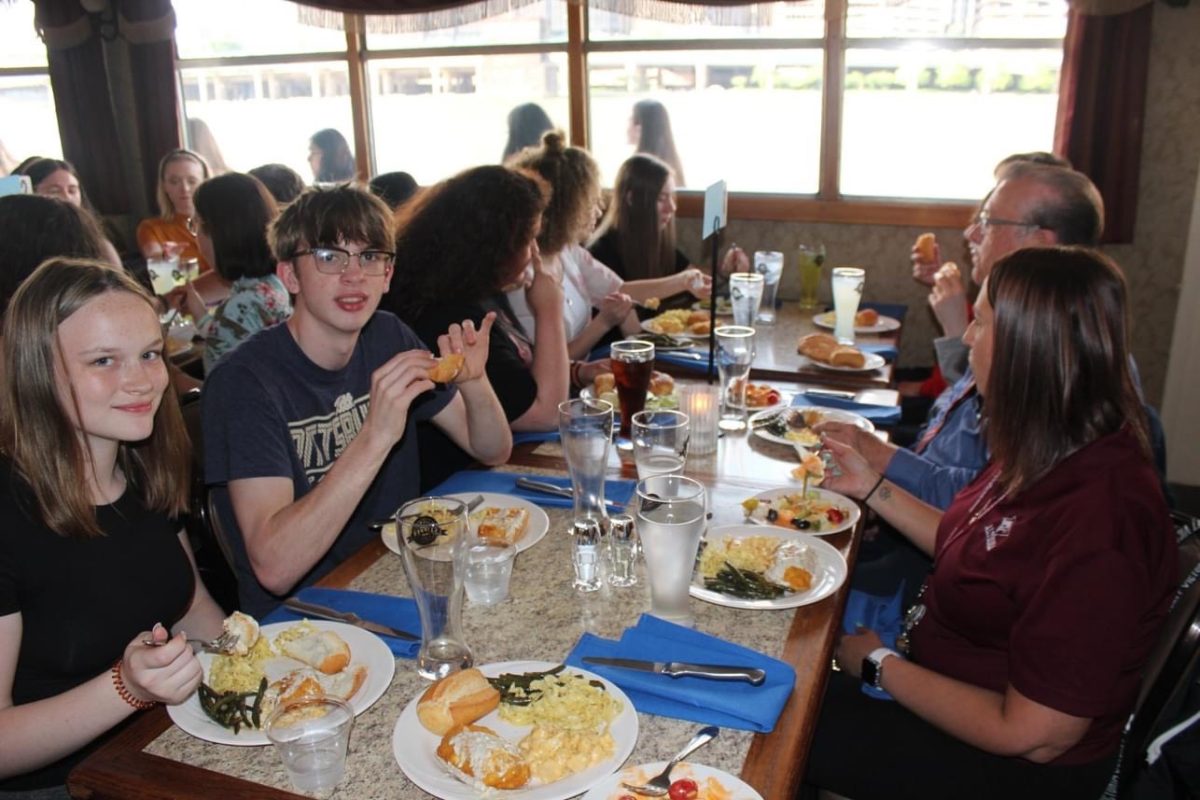 A new look on life. Students Dawn Dempsey (left) and Jordan Carlucci (right) try various foods of the French culture.  