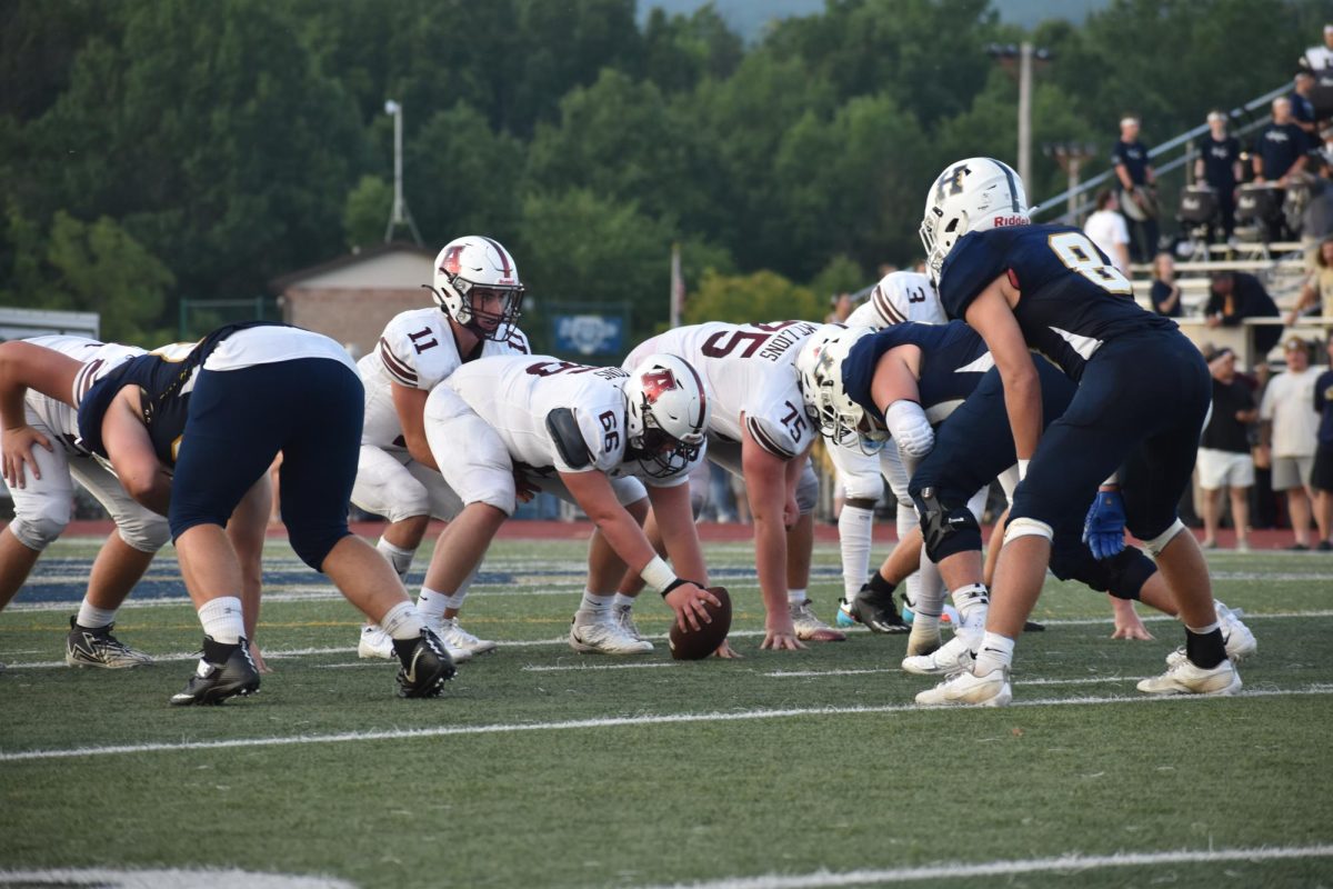 Down, set... Senior quarterback Brennen Freiwald sets back to take the snap against Holidaysburg on 8.25