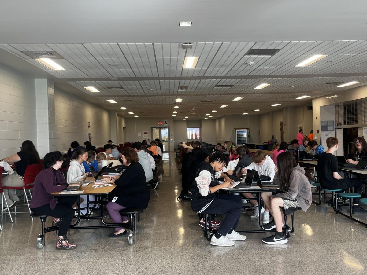 Students work in the closed cafeteria on Oct. 25 during class coverage time.  Amy Martin and Audrey Cromell report each day during seventh period to make sure all students without teachers are supervised.