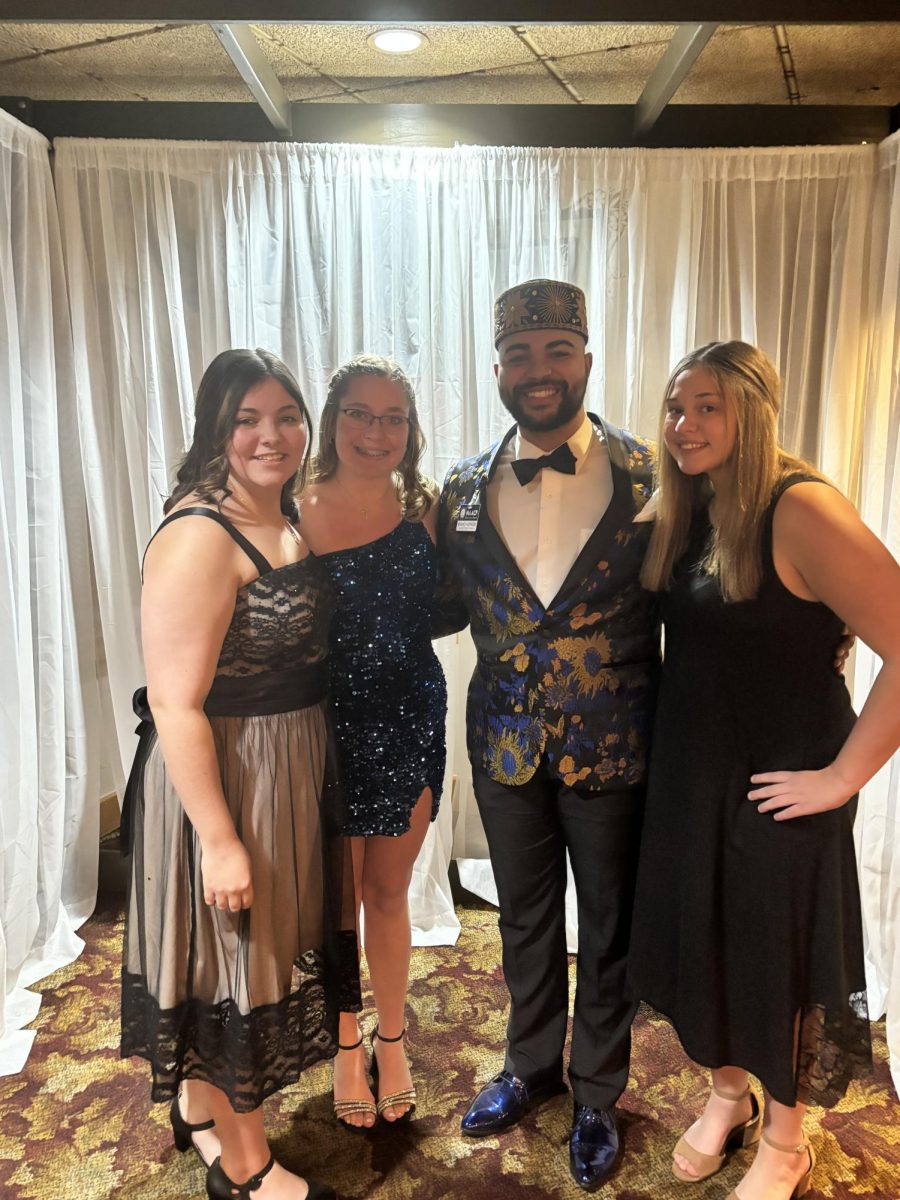 Celebration. Three Mountain Echo editors, celebrated 100 years of the Blair County NAACP branch at their annual gala. From left to right: sophomore Madison Aboud, senior Jaidyn Palladini, Andrae Holsey and junior Charlie Kephart. 