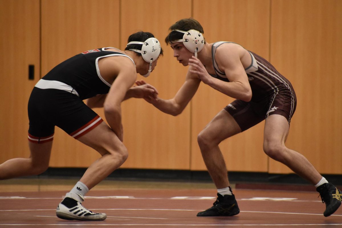 Altoona Alumni Will Young wrestles in the neutral position in the meet against Tyrone. 