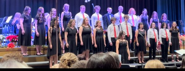 Hark how the bells. At the annual holiday concert, the Vocal Ensemble performs Carol of the Bells/ Wayfaring Stranger. 