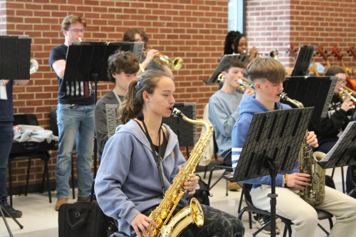 Getting into the groove. Advance Jazz Band members practice independently for their concert before the start of class. 