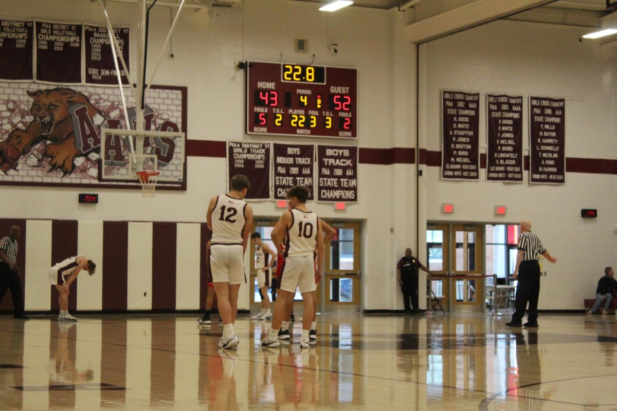 Junior MJ Harrington and sophomore Seth Simmendinger line up while the opposing team shoots foul shots. With 22 seconds left, down by 9 points, Altoona had to foul to try and get the ball. The team ended up losing 55-43 Williamsport. 