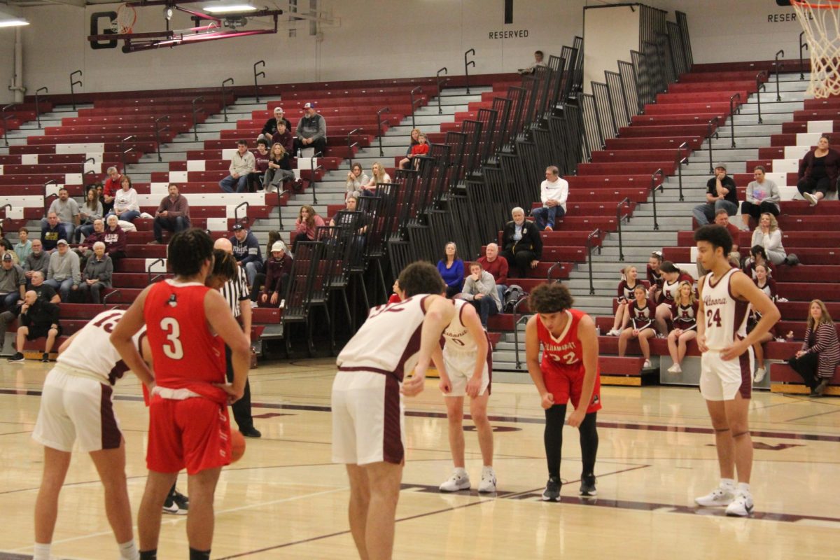 Be ready. Senior Joshua Corso and sophomore Dante Laracco line up in the key for a foul shot from the other team. This was a foul on senior Cohen Crawford, being his first of the game. 
