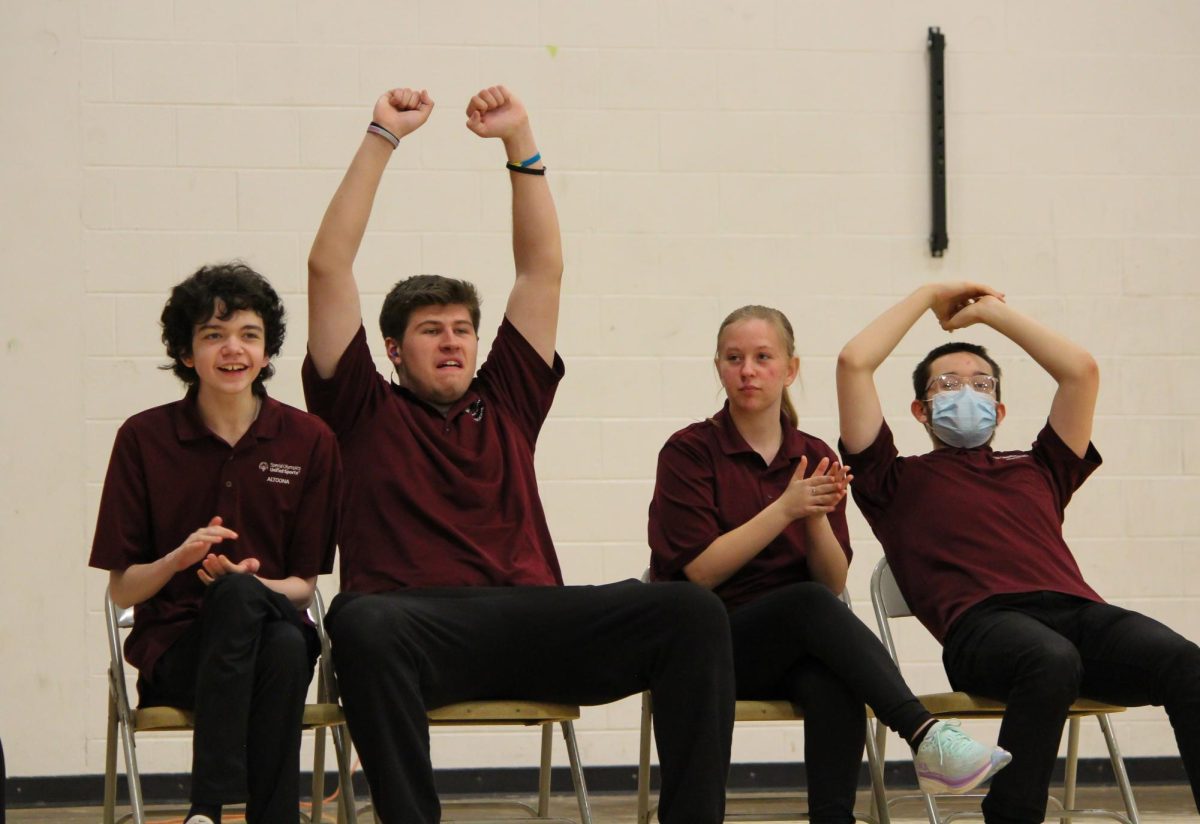 Celebration. Members of the bocce team celebrate after winning the match. Altoona hosted a bocce tournament of 12 teams on Feb. 3. Altoona placed third overall. 