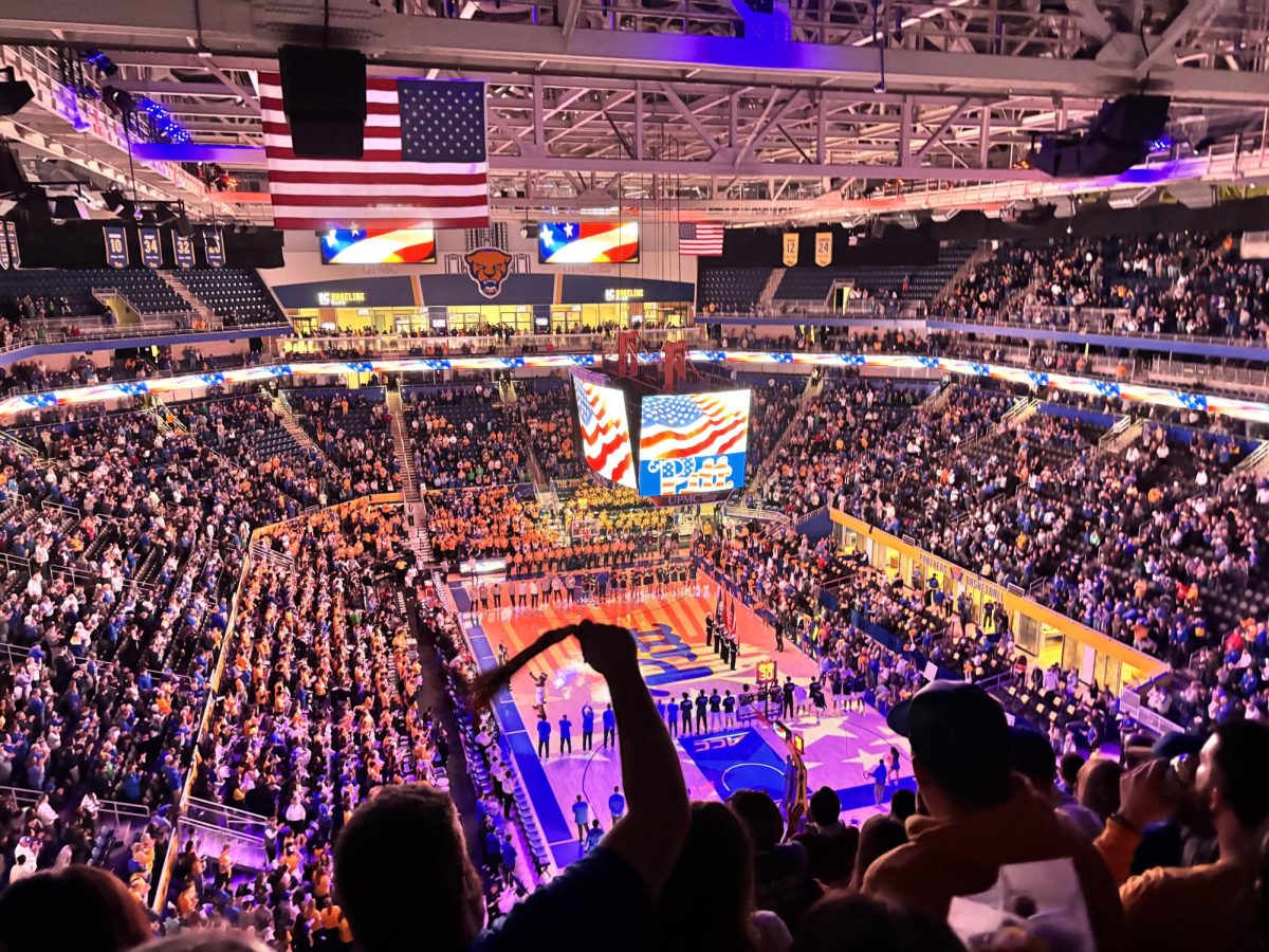 Lets go Pitt! On Sat. Feb. 3, Pitt basketball went up against Norte Dame. The crowd goas wild after the band plays The Star Spangled Banner. 