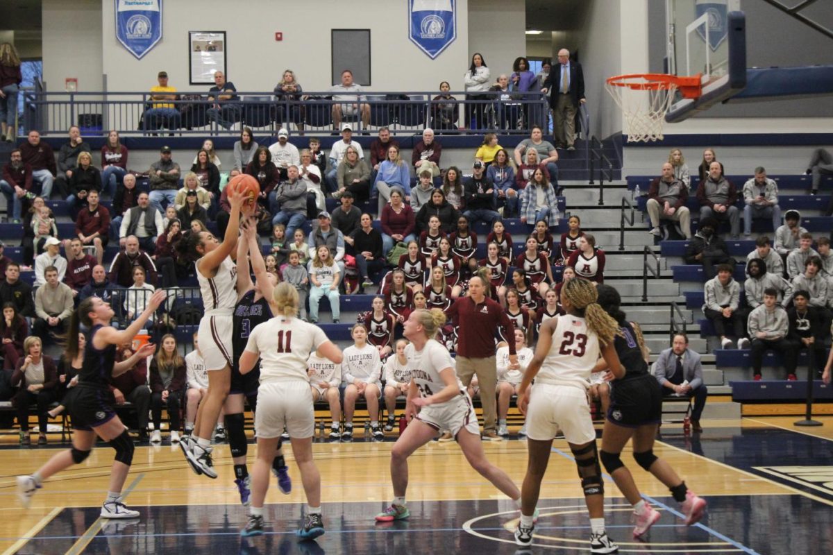 Sophomore Zaelinh Nguyen-Moore jumps and grabs the rebound from the other team. This photo was from the girls D6 Championship game where they played Mifflin County in the 2022-2023 season. Altoona ended up winning 61-35.  