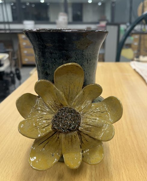 Shining bright. Senior Alivia Crawfords vase sits on display in the classroom. 