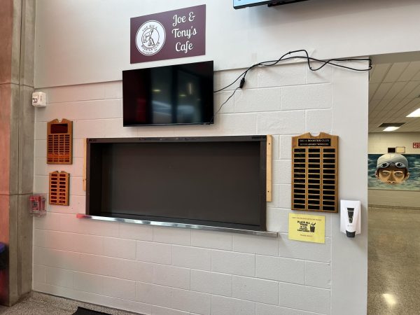 The Big A Booster concession stand in the Field House. The plaques placed around it have the names of the past students who have won the Big A Booster scholarship.  
