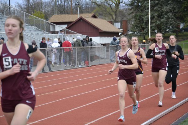 Push Through. Sophomore Emerson Snare  fights to beat the other teams through the finish line. This was in the 1600 meter race. Snare placed fifth. 