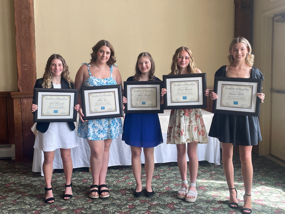 Women in business. From left to right, students Leah Petrunak, Rhea Liss, Miley Naugle, Kenly Bennett, and Cadence Ellick pose with their YEA plaques. After committing to weekly classes and growing their business plans, all the YEA students attended an investor panel and a graduation ceremony. 