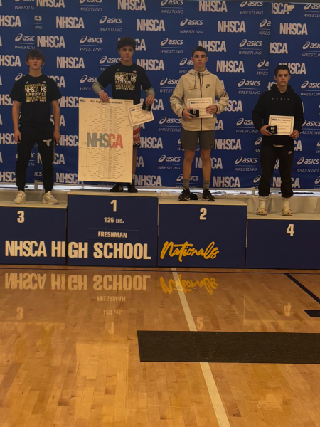 Fourth and Proud. Freshman Gavin Ciampoli stands on the Podium  after wrestling in the NHSCA All-American Championships.