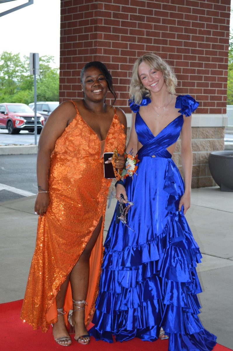 Best of friends. Seniors Aaliyah McGee and Meleah Lang pose for a photo on the red carpet. These two enjoyed their last school dance together. 