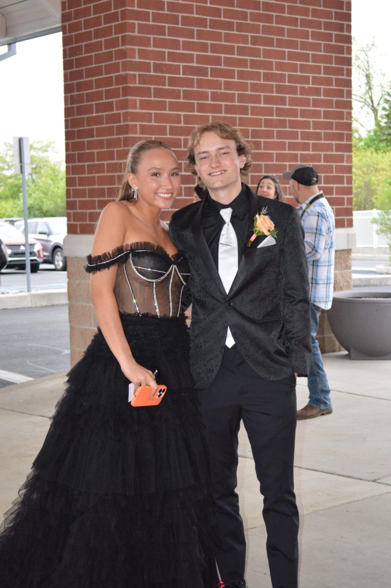 Plus one. Senior Aleah Layton dances the night away with her  boyfriend Sean Eakins, who graduated from Altoona last year. Students were able to bring guests from other schools as well.