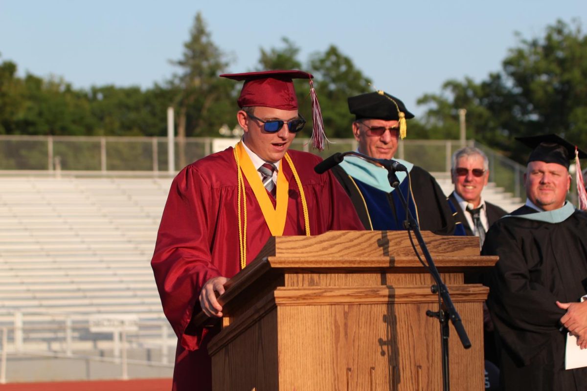 Jacob Steinbugl delivers the benediction speech at graduation last school year. This year, the benediction will be delivered by senior Jake Yohn. 