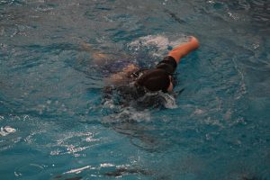 Sophomore Alexander Pfahler takes laps in the school pool. 