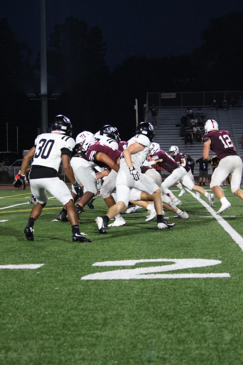 The team makes a play during the third quarter. The theme of the game was military appreciation. 