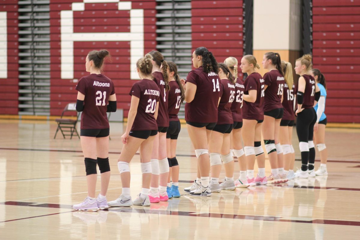 Get ready. The team lines up moments before the start of a game.