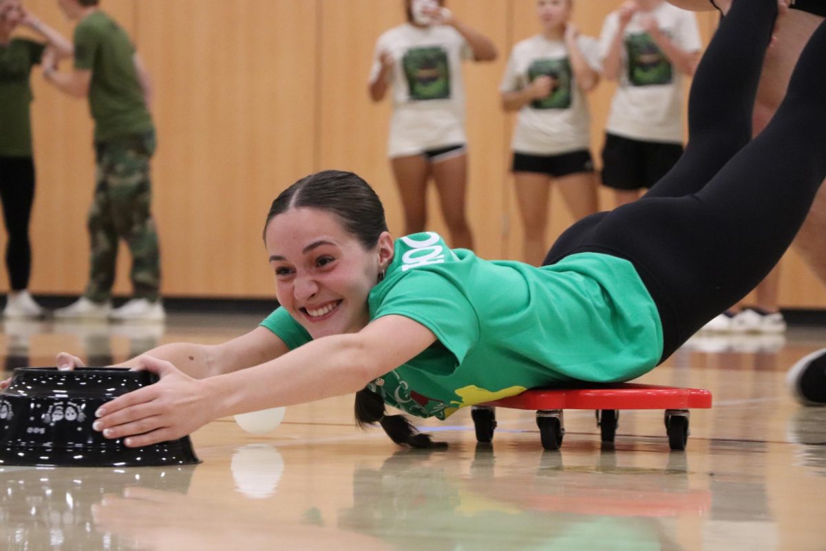 Senior Lauren Walgrove competes in Hungry, Hungry Hippos at last year's Games Night. Games Night will be held in the fieldhouse. 