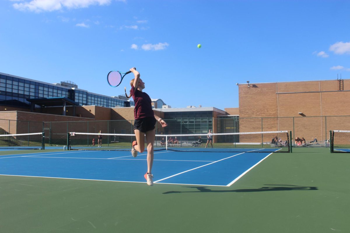 Smashing it. Senior Courtney Irwin returns her opponent's deep ball at the Kiski Area away match on Thursday, Sept. 19. C. Irwin played singles during the match.