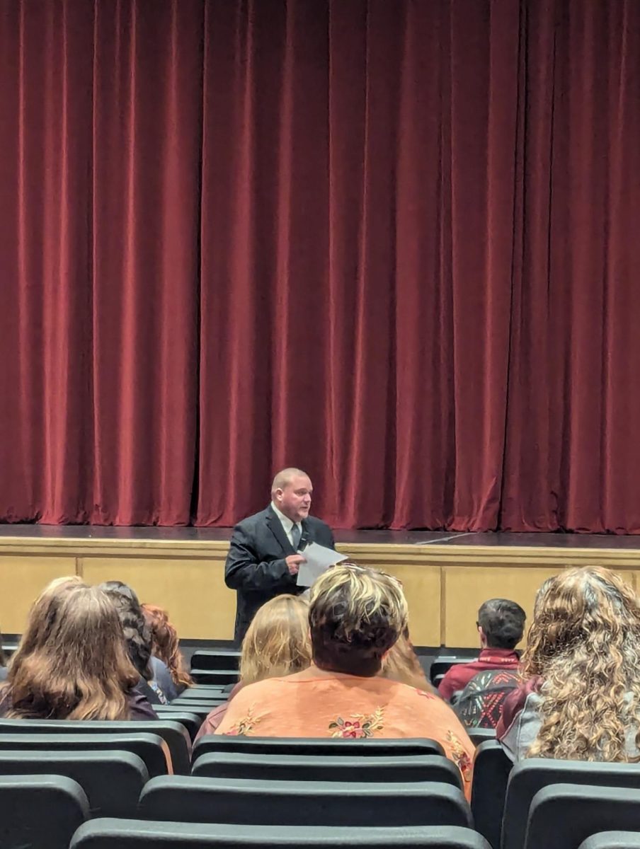 Superintendent Brad Hatch addresses teachers at 9 a.m. Friday morning prior to student arrival.  Hatch assured teachers the threat had been investigated. 