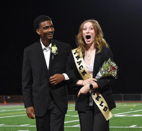 Alannah Irwin and escort Mazin Ahmed's react to winning. Irwin was crowned by last year's queen, Aleah Layton. 