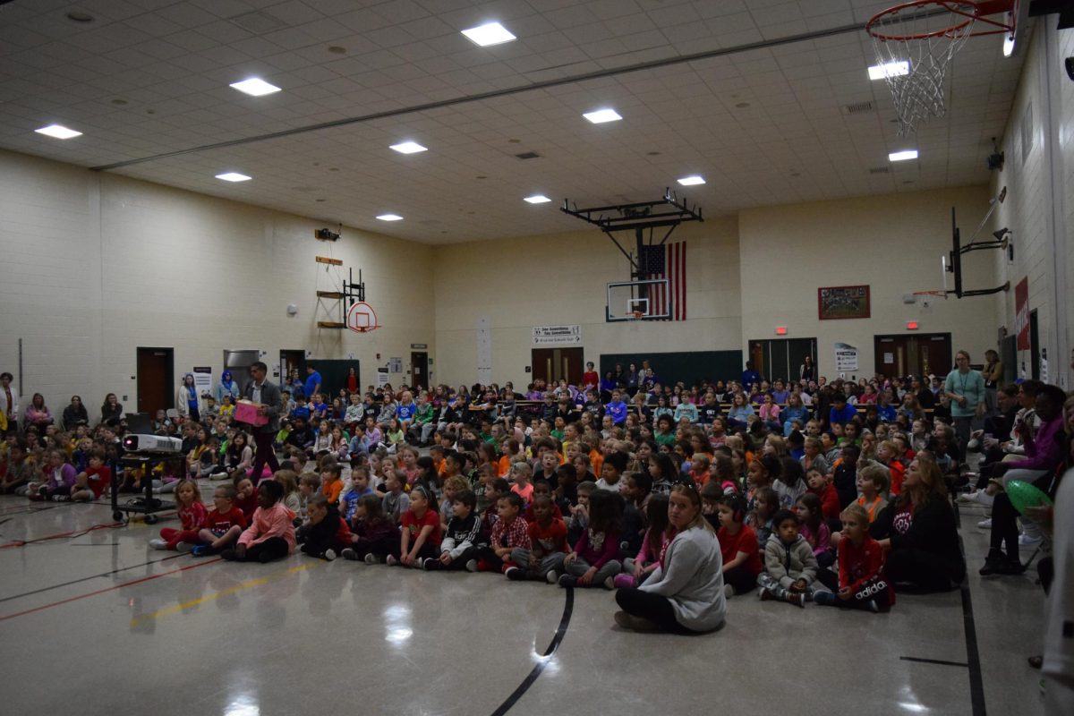 Kick off. Grades kindergarten through fifth patiently waiting for the assembly to start off. The event was held in the school's gym. 