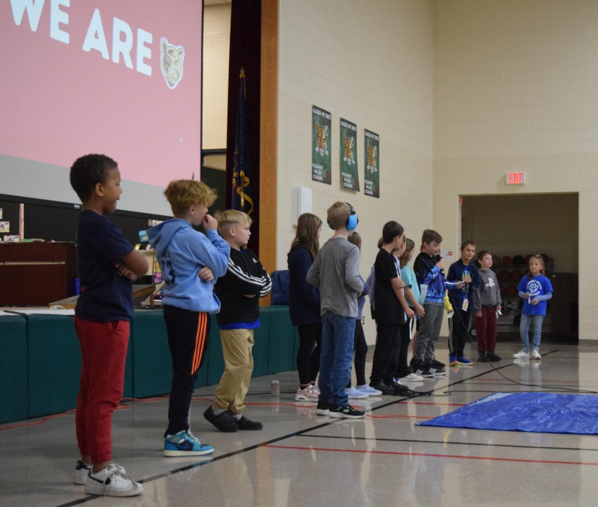 Working together. Fourth graders start reading out a line on teamwork. The assembly promoted beneficial values to the students. 