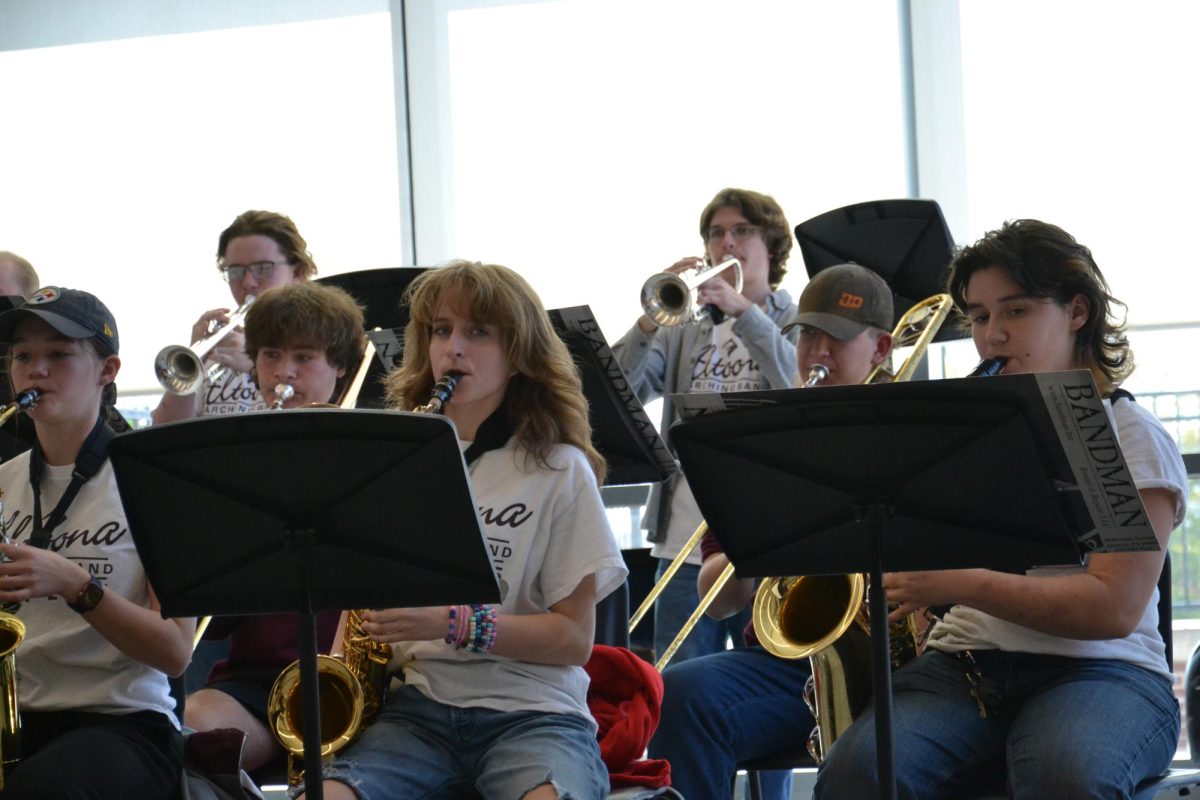 Loud and proud. The Advanced Jazz Ensemble performs for the Navy Commodores before being given feedback