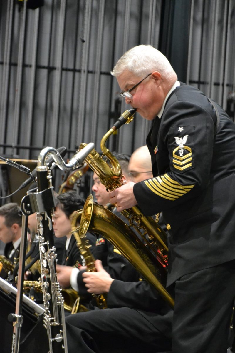 Hard at work. Many Navy Commodores play more than one instrument. Many showed off their skills during their performance. 