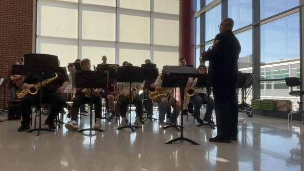 Listening in. On Oct. 18, the Navy Commodores came in to work with the Advanced Jazz Ensemble. After the clinic, they performed for the music students. 