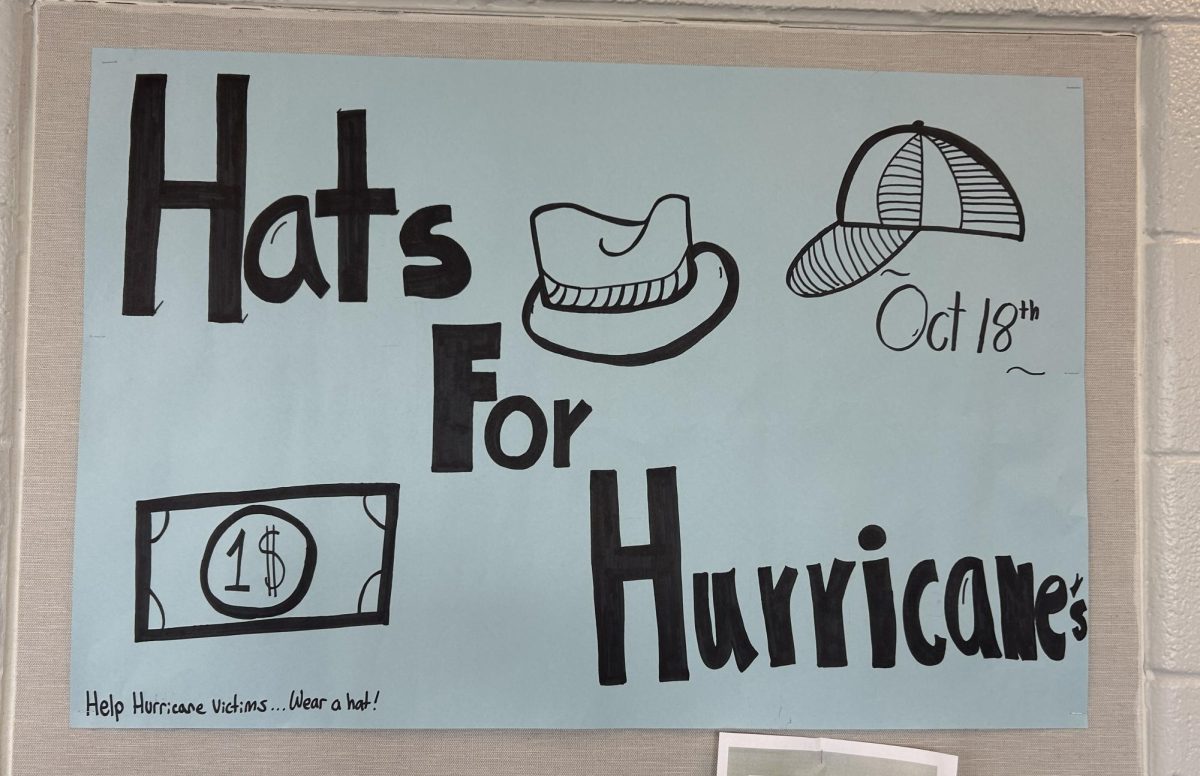 Flyers hang around the school to promote the fundraiser. "Hats for Hurricanes" will donate money to families in need. 