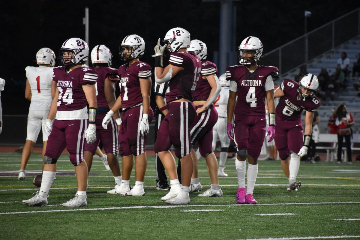 Timeout. Altoona waits for direction from head coach Vince Nedimyer at the game on Sept. 6, against Cumberland Valley. (Courtesy of Haley Tanzi)
