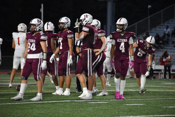 Timeout. Altoona waits for direction from head coach Vince Nedimyer at the game on Sept. 6, against Cumberland Valley. (Courtesy of Haley Tanzi)
