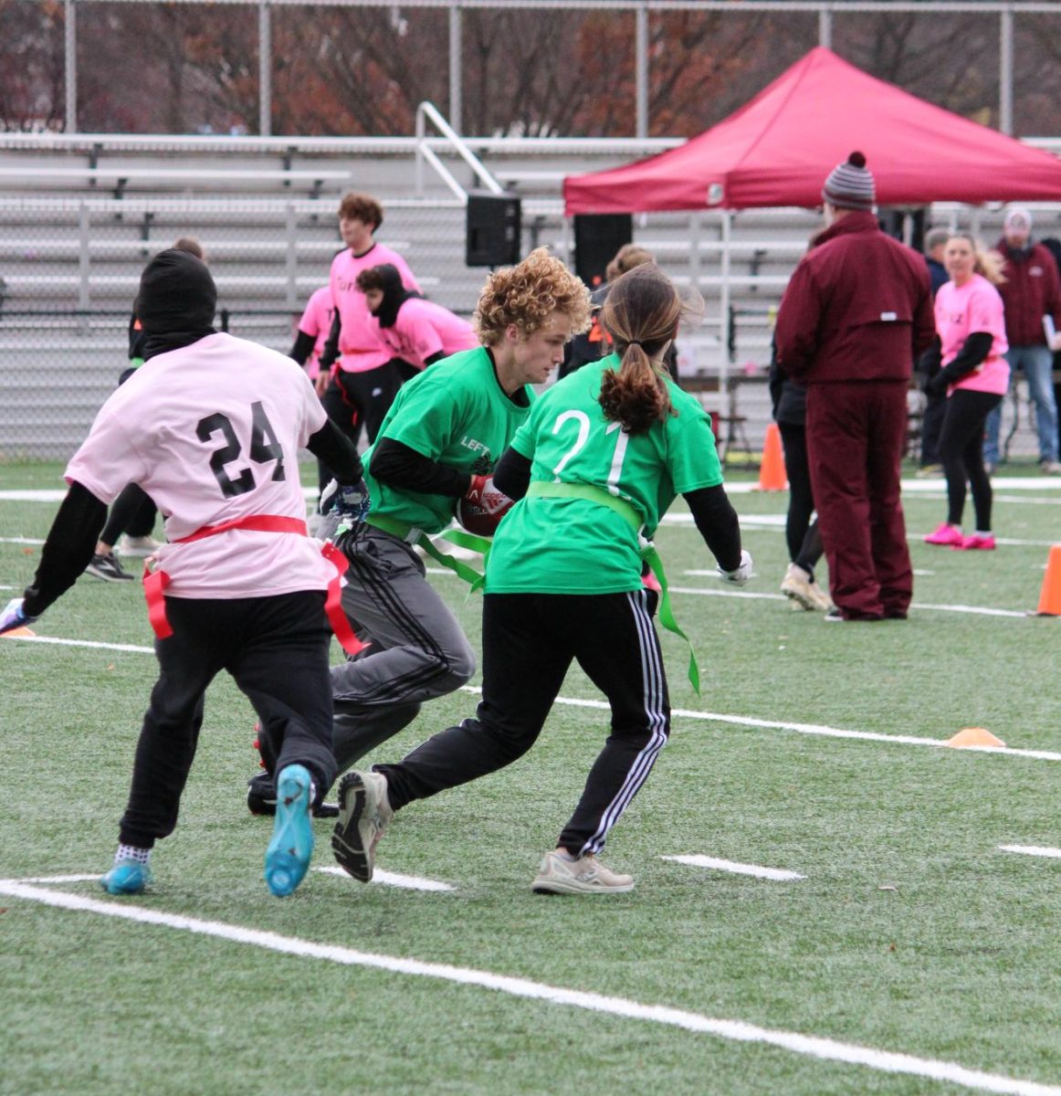 Running to victory. Junior Collin Etters runs a play. Etters played on The Leftovers. 