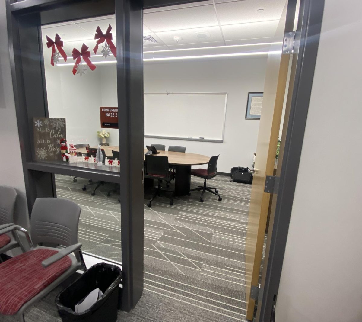 Confrontation. One of the many conference rooms used for suspected students. Tenth grade principal Erik Dambeck's conference room is often used. 