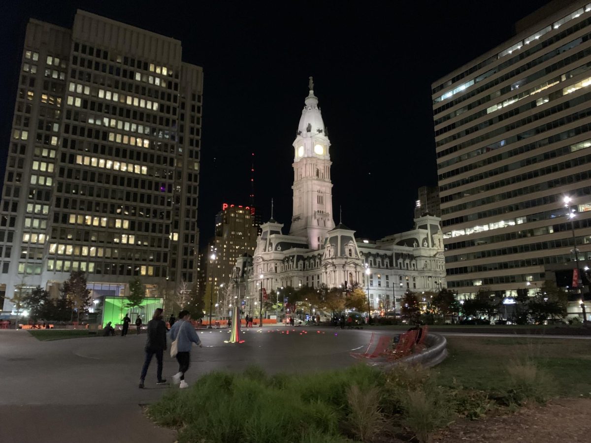 Philadelphia at night. The City of Brotherly Love shines under a dark sky.