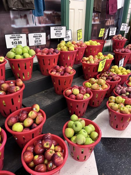 Apple season. Barrels of all kinds of apples stand waiting to be bought at Leighty's Farm Market. The market was located in Newry, Pa. and was known for their extensive produce selection.