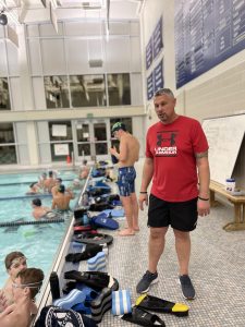 Kephart coaches the swimmers by correcting their technique. Kephart also coaches at the Blair Regional YMCA. 