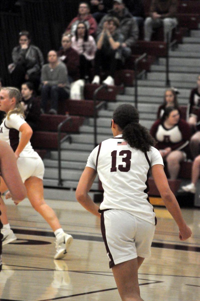 Court support! Freshman Brionna Hudson moved swiftly down the court during the game. She stays focused, ready to support her teammates.