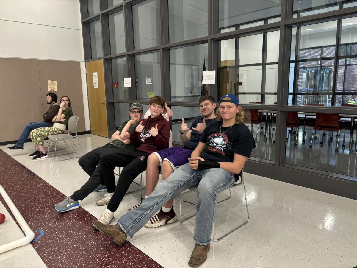 Practice. The bocce team sits and takes time to rest during practice. They are looking to become better as the season goes on. 