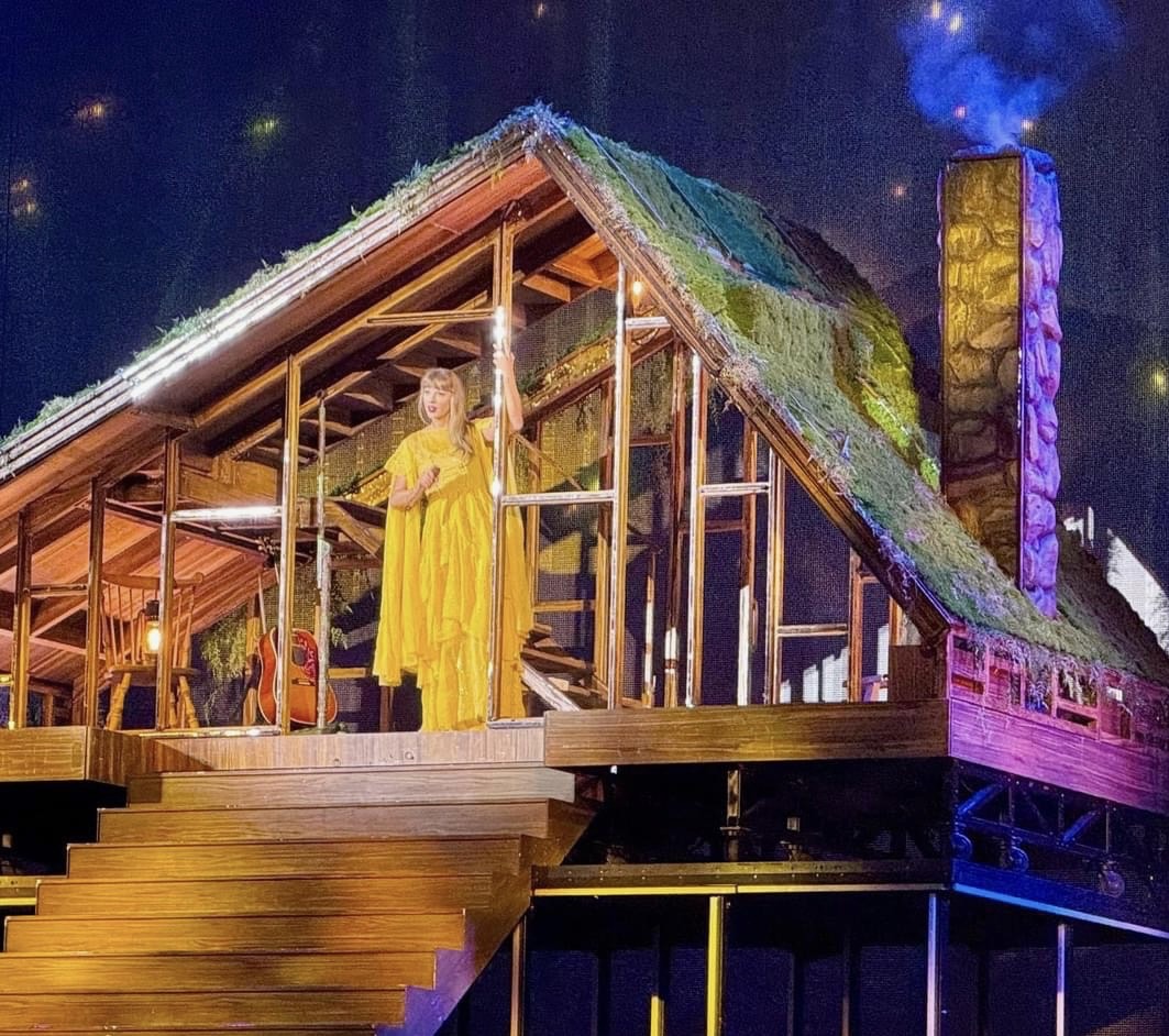 Folklore's allure! Swift performed parts of her album "Folklore" inside a cabin on stage. Many fans love this era of the show, as the cabin captures the essence of the songs