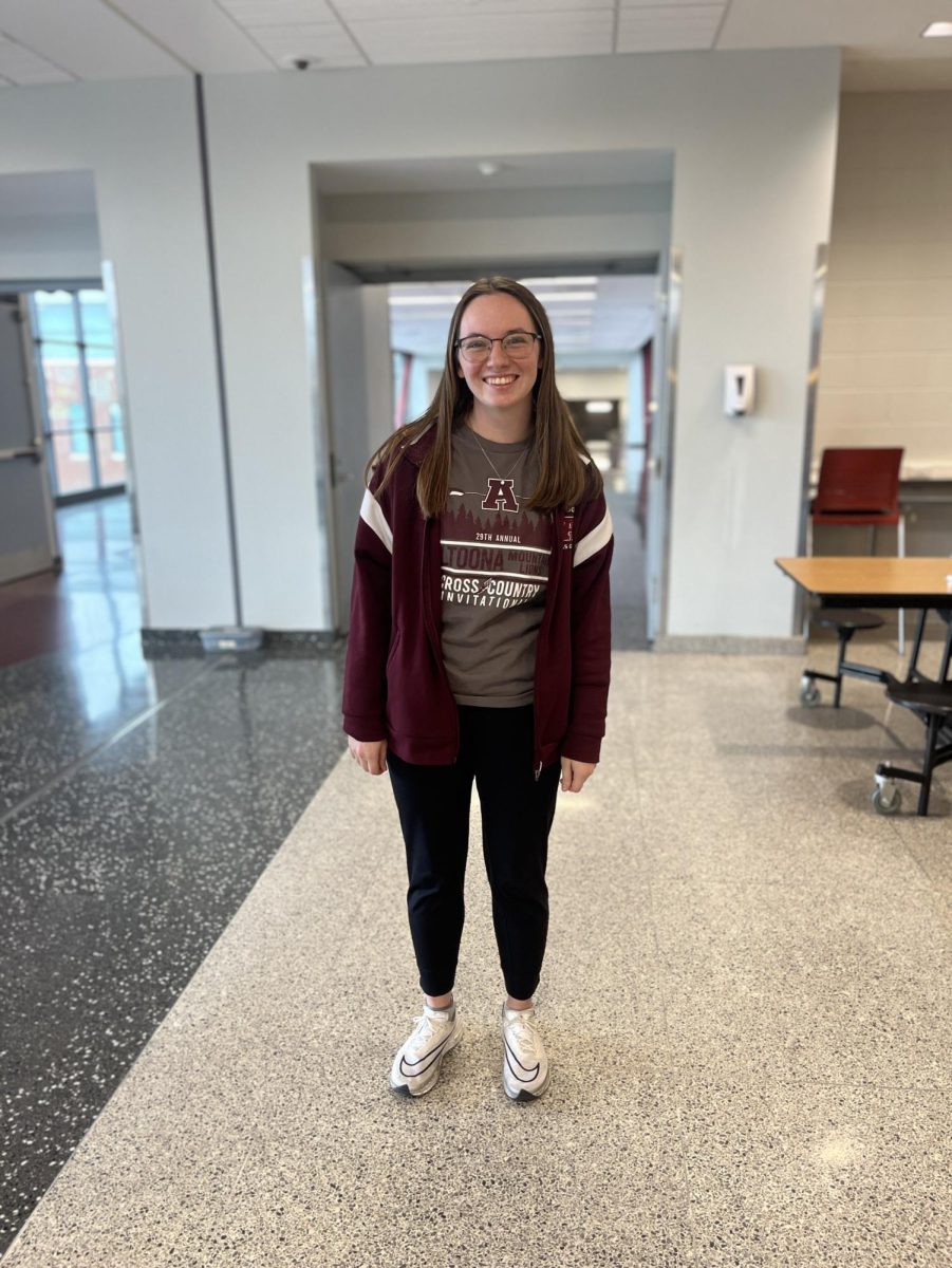 Senior Anna Resig represents Altoona spirit with her maroon and white attire.