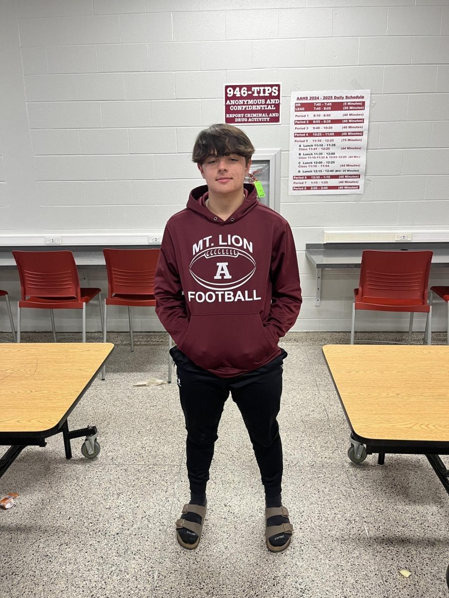 Freshman Hazen Beagle stands talls in his maroon and white Altoona gear.